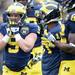 Michigan wide receiver Drew Dileo tries to stay warm during spring practice at Michigan Stadium on Saturday, April 13, 2013. Melanie Maxwell I AnnArbor.com